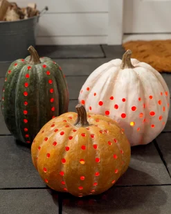 Lit Cut-Out Pumpkins