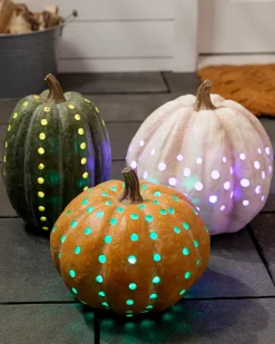 Lit Cut-Out Pumpkins