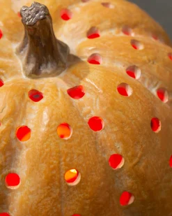 Lit Cut-Out Pumpkins