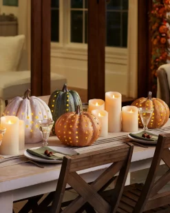 Lit Cut-Out Pumpkins